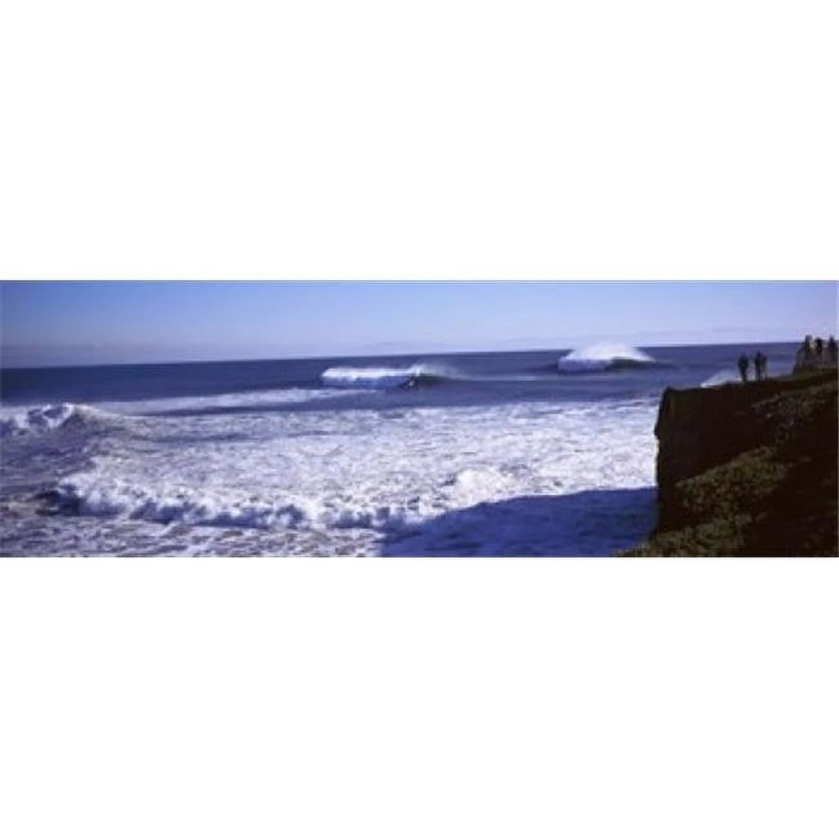 Tourist looking at waves in the sea Poster Print - 36 x 12 T913062